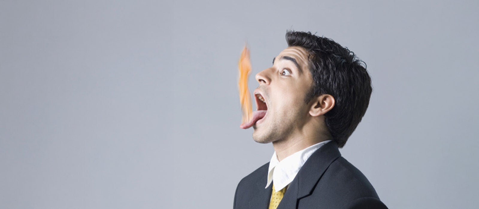 Getty Images #:84595652, Businessman with burning tongue